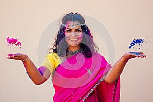 Holi Festival Of Colours. Portrait of happy indian girl in traditional hindu sari on holi color . india woman silver