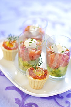 Holiday appetizers with salmon and red caviar