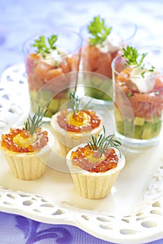 Holiday appetizers with salmon and red caviar