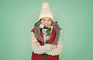 Holiday atmosphere. no hypothermia. cheerful girl wearing layers of clothing. warm cloth at wintertime season. cold