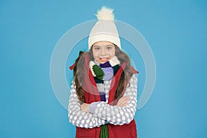 Holiday atmosphere. no hypothermia. cheerful girl wearing layers of clothing. warm cloth at wintertime season. cold