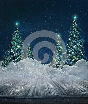 Holiday background with Christmas trees in snow