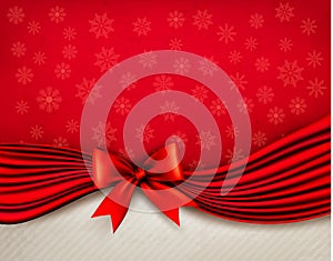 Holiday background with gift glossy bow and ribbon