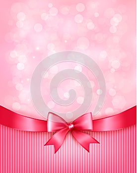 Holiday background with gift pink bow and ribbon.