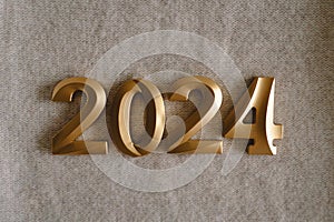 Holiday background Happy New Year 2024. Numbers of year 2024 with sweater