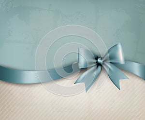 Holiday background with old paper and gift bow photo