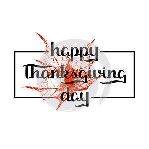 Holiday background with red maple leafe and hand drawn words happy thanksgiving day in a frame photo