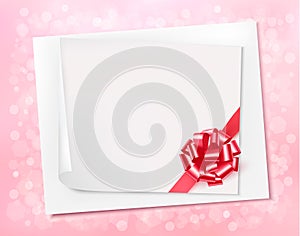 Holiday background with sheet of paper and pink bo