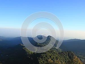 Holiday with beautiful sky on the top summit Tugu Mountain in Pekalongan, Indonesia.