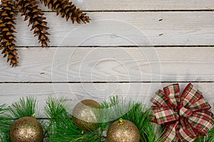 Holiday border with greenery along the bottom and copy space