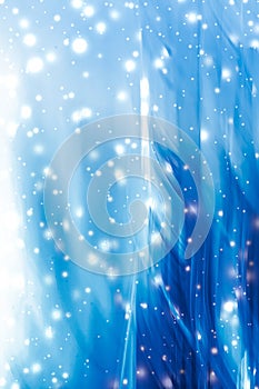 Holiday brand abstract background, blue digital design with glowing snow