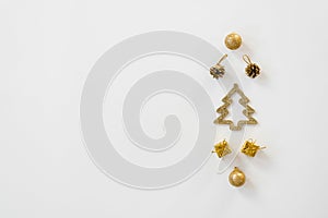 Holiday and celebration concept for postcard or invitation. Christmas or new year border. Christmas decorations in gold and brown
