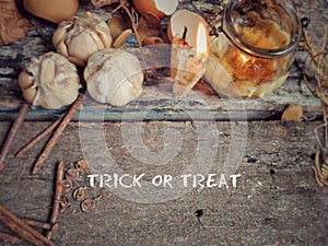 Holiday Celebration Concept - Trick or treat text written on wooden surface background. Stock photo photo