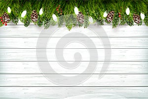 Holiday Christmas background with branch of tree and garland on