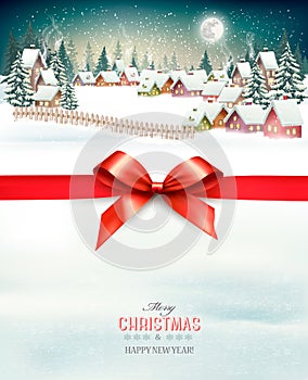 Holiday Christmas background with a winter village and red bow.