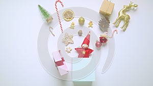 Holiday Christmas card background with festive decoration. Alternate Christmas and New Year holidays gift boxes on white