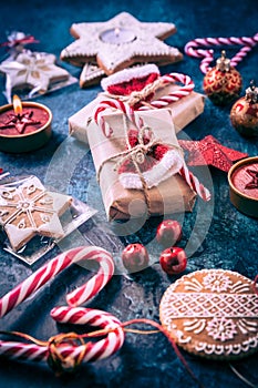 Holiday Christmas Gifts with Boxes, Candle and gingerbread cookies