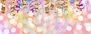 Holiday colorful panoramic background with ribbon and blurred bokeh lights