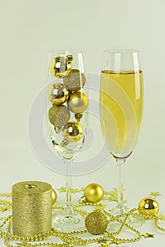 Holiday congratulations gift new year  champagne glass christmas decorations golden shiny balls isolate white background