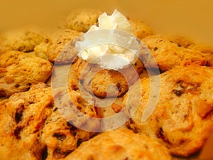 Holiday cookies biscuits sweet sugary plate of pastry and white whipped cream