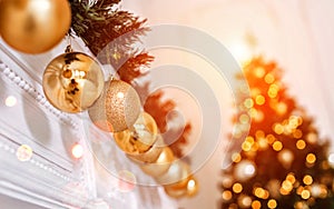 Holiday decorated room with Christmas tree and decoration, background with blurred, sparking, glowing light