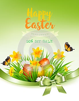 Holiday easter background with a colorful eggs and spring flowers in grass