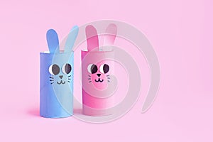 Holiday easy DIY craft idea for kids. Toilet paper roll tube toy's cute rabbit's on minimal background banner