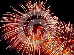 Holiday firework red-orange splashes