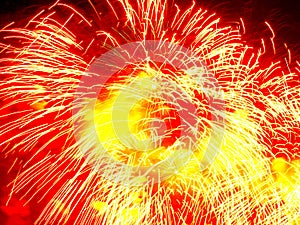 Holiday firework, red and yellow splashes