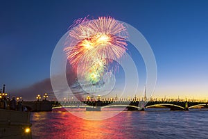 Holiday fireworks over Troitsky bridge in St. Petersburg, Russia