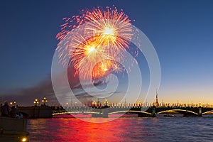 Holiday fireworks over Troitsky bridge in St. Petersburg, Russia