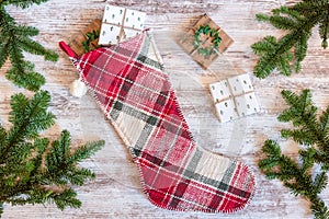 Holiday flat lay with Christmas stocking and gift card boxes