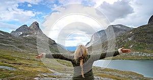 Holiday freedom, mountain view and woman in nature for travel, adventure and peace in Norway. Lake hiking, calm