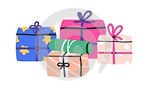 Holiday gift boxes wrapped in decorative festive paper wrapping, tied with bows. Many presents, surprise packages for