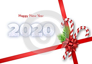 Holiday gift card. Happy New Year 2020. Snow numbers, fir tree branches, tied bow and candy canes on red ribbons. Isolated on