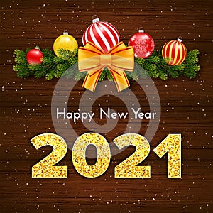 Holiday gift card Happy New Year with fir tree branches garland. Golden numbers 2021 with shadow on wood background