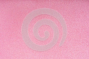 Holiday glowing pink sparkle backdrop. Abstract vibrant festive glitter christmas background