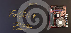 Holiday greeting card for Father`s Day on a black background - machines, computer boards, with the text - Happy Father`s Day