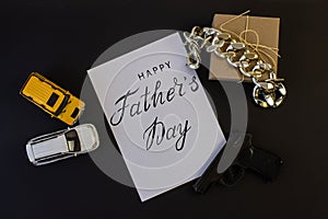 Holiday greeting card for father`s day with text on a black background, brutal