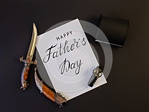 Holiday greeting card for father`s day with text on a black background, brutal