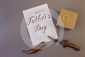 Holiday greeting card for father`s day with text on a gray background, brutal