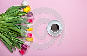 Spring background!A bouquet colorful tulips on pink background.Holiday greeting card for Valentine`s Day, Woman`s Day, Mother`s Da