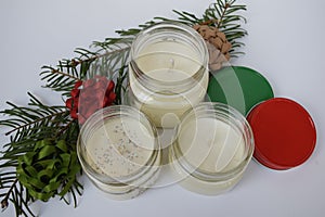 Holiday hand poured Mason jar candles with glitter.