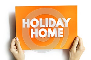 Holiday Home is accommodation used for holiday vacations, corporate travel, and temporary housing, text concept on card for