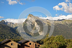 holiday homes on a resort with a mountain backdrop view