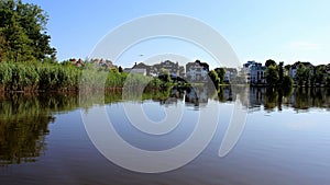 Holiday house and wetland in summertime