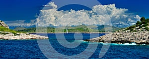 Holiday on Kornati islands in Croatia sailing ship cumulus clouds