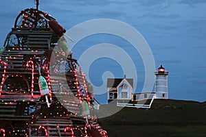 Holiday Lighthouse with Wooden Lobster Trap Tree in Foeground in