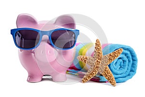 Holiday money planning, travel, retirement saving concept, Piggy Bank on beach vacation