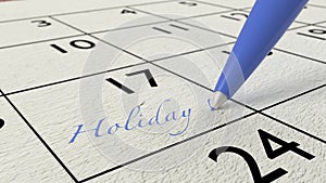 Holiday paper calendar entry and blue pen